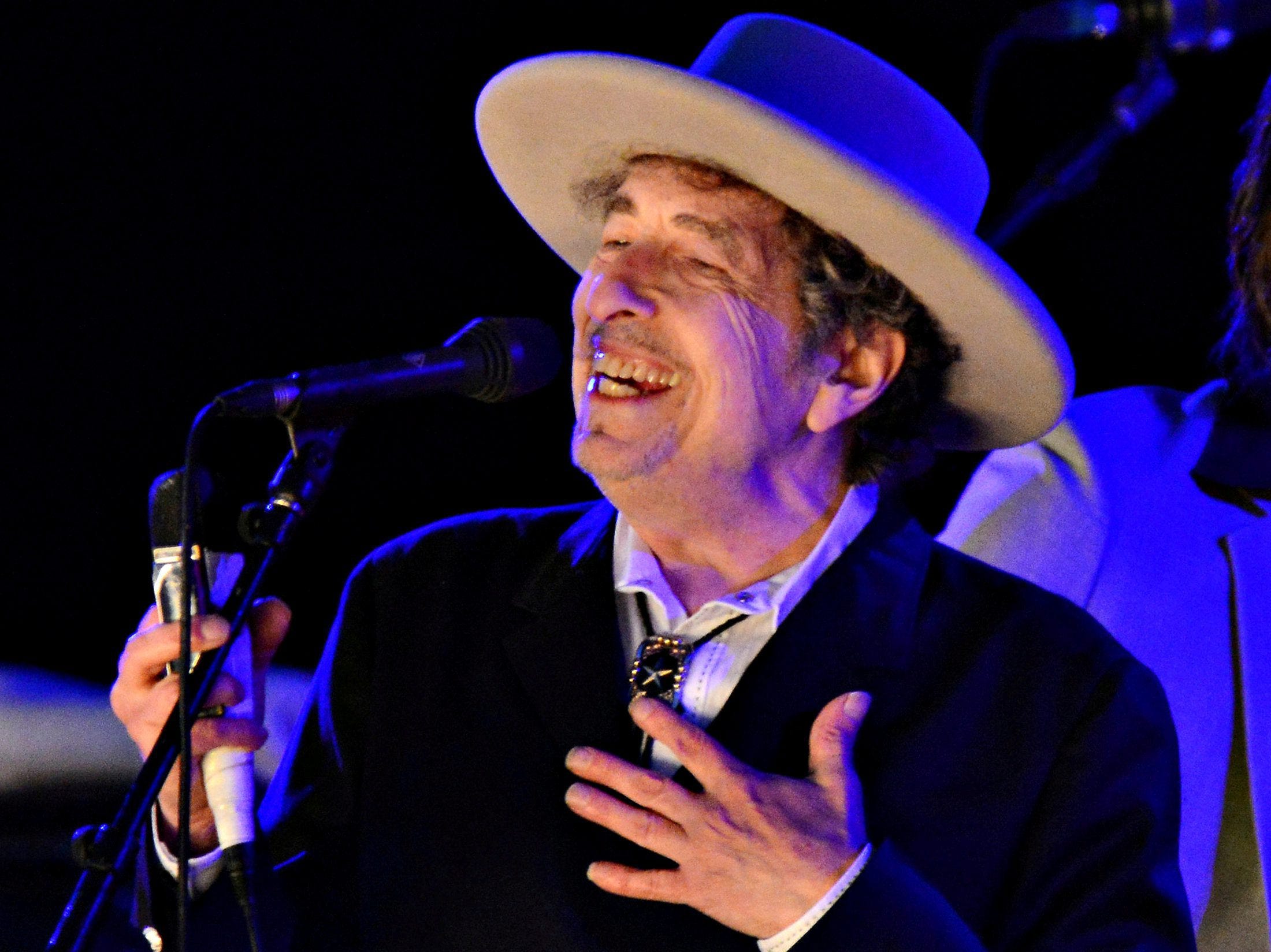 Bob Dylan finally accepts Nobel prize in low-key ceremony