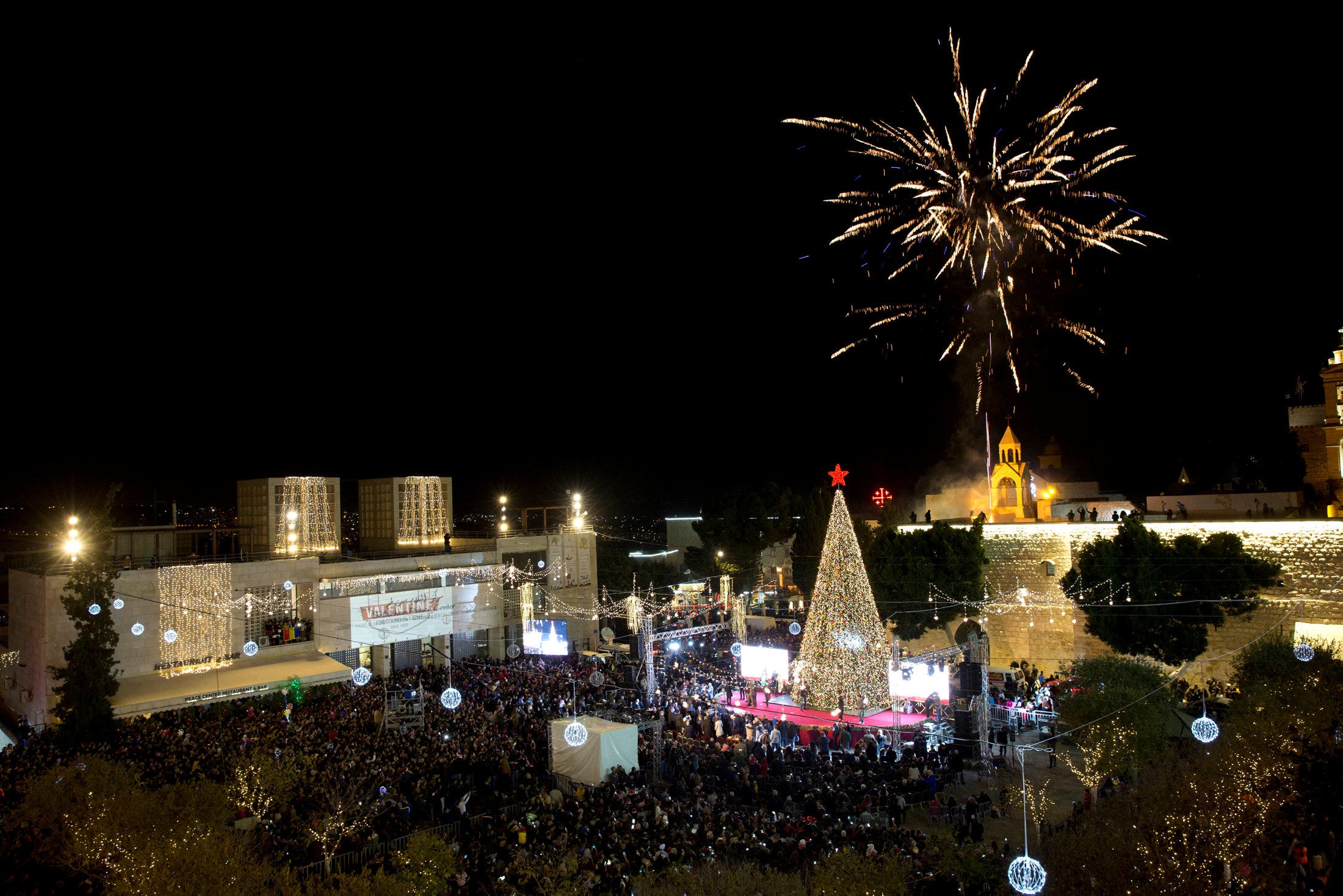 IN PHOTOS • Palestinians, pilgrims flock to Bethlehem for Christmas festivities