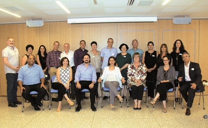 Partnering for Social Cohesion: Israel’s Minister of Social Equality, Gila Gamliel (seated center) between Jason Arison, Chairman of The Ted Arison Family Foundation and CEO Shlomit De Vries, together. r
