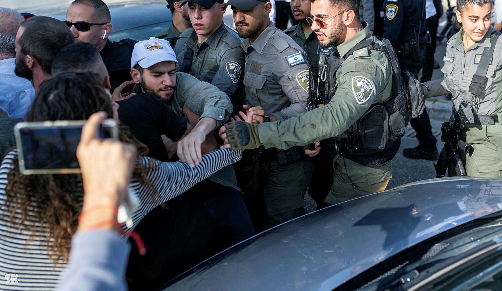 Activist Released After Being Arrested for Wearing Hat Depicting Palestinian Killed by IDF - Israel News - Vimarsana News