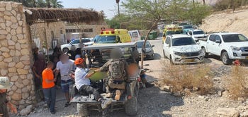 Injured hikers are evacuated from the trail, on Thursday.