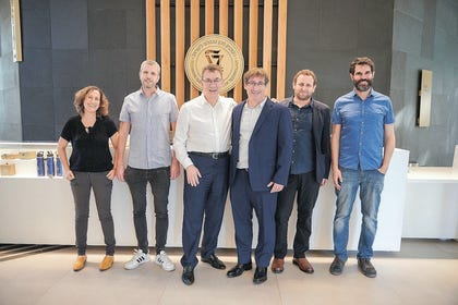 Dr. Albert Bourla, Chairman and CEO of Pfizer, (3rd from left) with Technion researchers