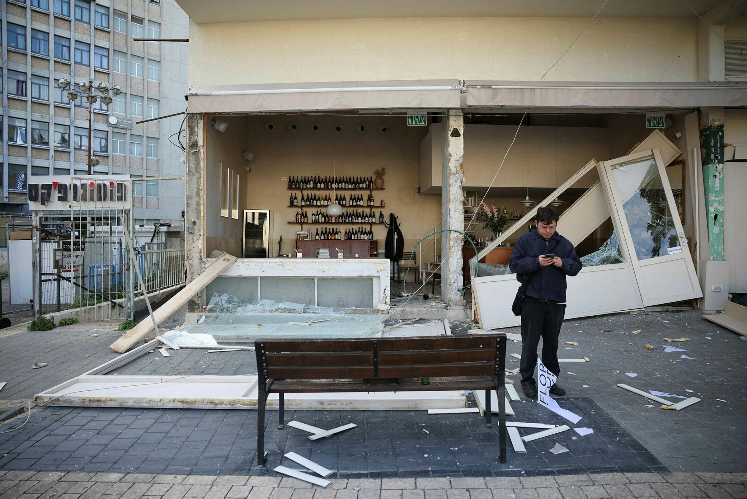 Only the shelves remain: Inside a shattered Tel Aviv wine bar