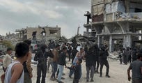Gunmen in Khan Yunis, in April.
