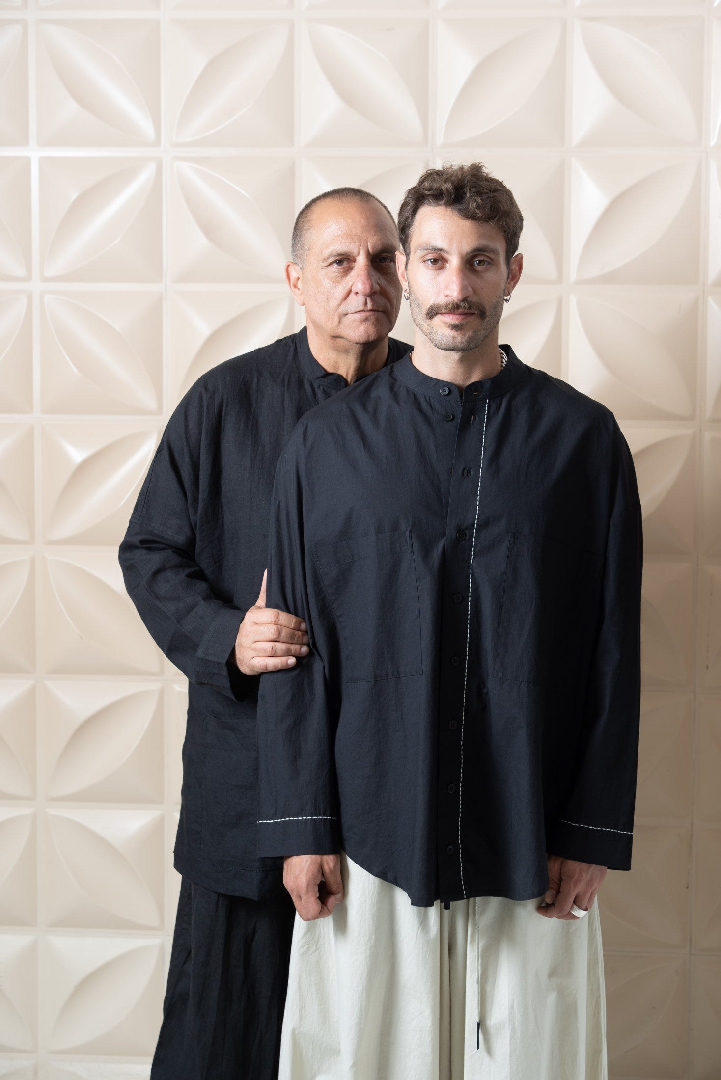 Sasson, left, and son Liam Kedem. "We designed pieces for men with presence, men who are grounded."