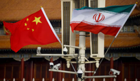 The national flags of China and Iran fly in Tiananmen Square, China, 2023.