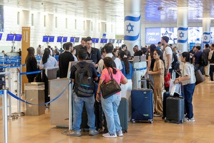 Passengers arrive at the departures hall of Ben Gurion Airport near Tel Aviv during the Iran conflict, in April.