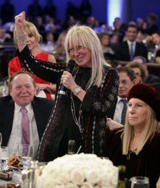 Miriam Adelson speaking at a Friends of the IDF event in Beverly Hills, California,  in 2014. "This family has been intensely meddling in Israeli politics for decades," MK Gilad Kariv wrote.