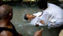 Christian pilgrims immerse themselves in the Shiloah Basin in the City of David in Jerusalem, this week.
