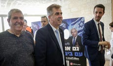 Energy Minister Eli Cohen, in the center, in the Likud primary vote, Tuesday. Credit: Itay Cohen Energy Minister Eli Cohen, in the center, in the Likud primary vote, Tuesday.