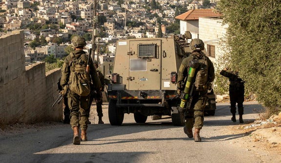 IDF soldiers in the West Bank town of Qabatiyah.