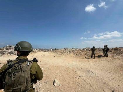 Israeli soldiers in Gaza this week. In Shujaiyeh only a small Palestinian militia force is operating, in cooperation with Israel, according to Arab media reports. Credit: Amos Harel Israeli soldiers in Gaza this week. In Shujaiyeh only a small Palestinian militia force is operating, in cooperation with Israel, according to Arab media reports.