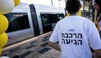 Supporters with shirts reading 'The train is coming' on Friday.