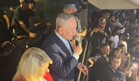 Benjamin and Sara Netanyahu at Eden Ben Zaken's concert. Netanyahu told the crowd, "The people of Israel live."