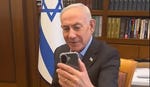 Netanyahu in a video inviting citizens to call him. Credit: Photo: From Benjamin Netanyahu's Facebook page Netanyahu in a video inviting citizens to call him.