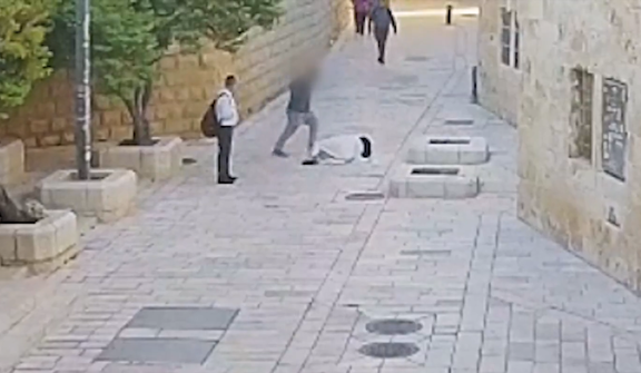 A frame from security footage showing 36-year-old Yona Schreiber assaulting a nun in Jerusalem's Old City in April.
