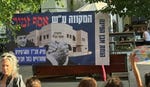 Ramat Aviv residents protest the municipality's approval of a new mikveh. "I understand those who fear that every new religious presence is part of an attempt to change the character of the neighborhood," says First Deputy Mayor Asaf Zamir. Ramat Aviv residents protest the municipality's approval of a new mikveh. "I understand those who fear that every new religious presence is part of an attempt to change the character of the neighborhood," says First Deputy Mayor Asaf Zamir.