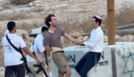 A screenshot from a video showing settlers abducting British activist Finn Joughin on Saturday. Credit: Use according to Section 27A of the Israel Copyright Law A screenshot from a video showing settlers abducting British activist Finn Joughin on Saturday.