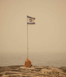 An Israeli flag near Tel Aviv's coastline, earlier this year. Credit: Moti Milrod An Israeli flag near Tel Aviv's coastline, earlier this year.