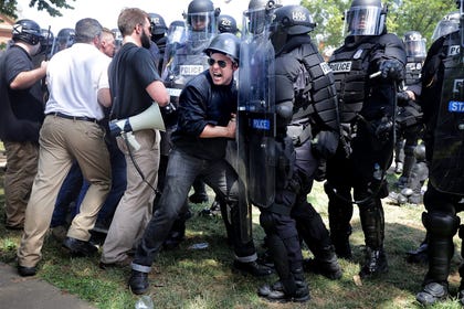White nationalists and neo-Nazis right clashing with police as they are forced out of Emancipation Park after the Unite the Right rally was declared an unlawful gathering in Charlottesville, Virginia on August 11, 2017. Credit: Chip Somodevilla/AFP White nationalists and neo-Nazis right clashing with police as they are forced out of Emancipation Park after the Unite the Right rally was declared an unlawful gathering in Charlottesville, Virginia on August 11, 2017.