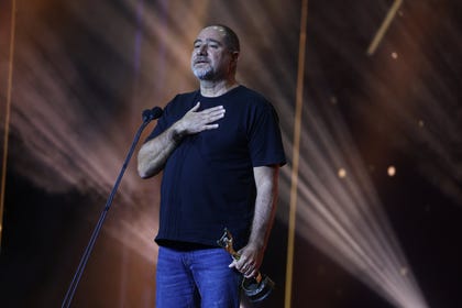 איהאב אליאס סלאמי עם פרס השחקן הטוב ביותר