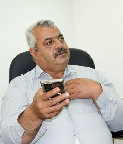 Al-Mughayyir council head Amin Abu Aaliya. "An American from Shiloh has the right to steal land from an American in Turmus Ayya, and to attack his home too," he says.