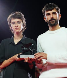 Israeli filmmakers Yuval Abraham and Rachel Szor accept the Special Jury Prize for their documentary "NAZA" at the Venice Film Festival in Venice, Italy, on Saturday. Credit: Scott A Garfitt/AP Israeli filmmakers Yuval Abraham and Rachel Szor accept the Special Jury Prize for their documentary "NAZA" at the Venice Film Festival in Venice, Italy, on Saturday.