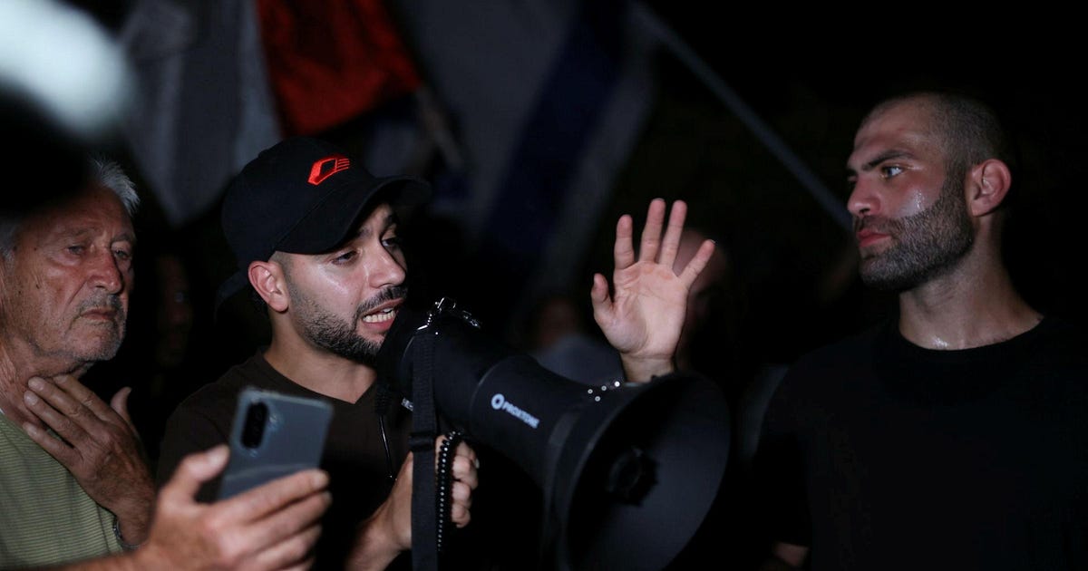 Right-wing agitators call to 'execute traitors' outside 'NAZA' filmmaker's ...