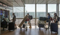 Families entering Israel's Ben-Gurion International Airport earlier this month. Credit: Tomer Appelbaum Families entering Israel's Ben-Gurion International Airport earlier this month.