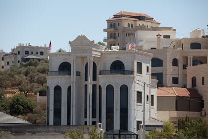 Most of the houses in Turmus Ayya are multi-story villas, many of which fly the American flag. Credit: Itay Cohen Most of the houses in Turmus Ayya are multi-story villas, many of which fly the American flag.