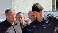 Police Commissioner Danny Levy, right, pointing next to National Security Minister Itamar Ben-Gvir, in Tel Aviv in March.