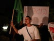 For second night in a row, dozens gather outside ‘NAZA’ filmmaker’s family home