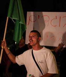 Protest in Savyon, Thursday, with a sign spelling "Traitors from within.". Credit: Itay Cohen Protest in Savyon, Thursday, with a sign spelling "Traitors from within."