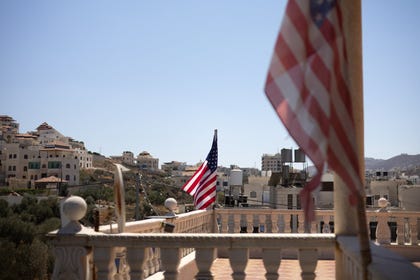 American flags flying from Samir Juma'a Hazmeh's balcony in Turmus Ayya on September 9. Credit: Itay Cohen American flags flying from Samir Juma'a Hazmeh's balcony in Turmus Ayya on September 9.
