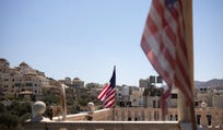 American flags flying from Samir Juma'a Hazmeh's balcony in Turmus Ayya on September 9.