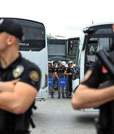 Turkish police stand guard outside a courthouse in Istanbul, Turkey, on Tuesday. Credit: Dilara Acikgoz,AP Turkish police stand guard outside a courthouse in Istanbul, Turkey, on Tuesday.