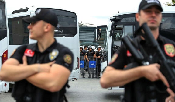 Turkish police stand guard outside a courthouse in Istanbul, Turkey, on Tuesday.