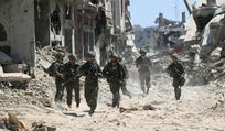 Israeli soldiers in the midst of Gaza's ruins, 2024.