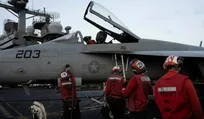 A U.S. fighter jet aboard the aircraft carrier USS George Washington last week.