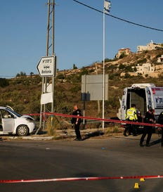 Israeli security forces inspect the scene where, according to police, a Palestinian man was shot and killed after ramming his car into a security checkpoint, seriously wounding an officer, near the West Bank Jewish settlement of Beit Horon, Wednesday. Credit: Ohad Zwigenberg/AP Israeli security forces inspect the scene where, according to police, a Palestinian man was shot and killed after ramming his car into a security checkpoint, seriously wounding an officer, near the West Bank Jewish settlement of Beit Horon, Wednesday.