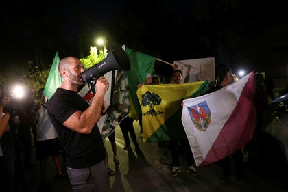 Right-wing activist Ziv Baranes protesting outside the family home of "NAZA" filmaker Rachel Szor, in Savyon, Israel, last Thursday. Credit: Itai Cohen Right-wing activist Ziv Baranes protesting outside the family home of "NAZA" filmaker Rachel Szor, in Savyon, Israel, last Thursday.
