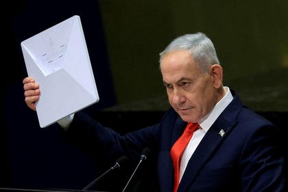 Brendan McDermid/Reuters Israeli Prime Minister Benjamin Netanyahu holds up a Starlink device as he addresses the 81st United Nations General Assembly at UN headquarters in New York City, US, Thursday.