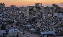 Ruins in Gaza City, Wednesday. Around 5,000 would-be police officers have passed screening, but Israel is preventing them from leaving Gaza for training in Egypt.
