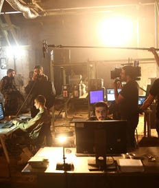 A crew films a scene on the set of Israel's hit TV show "Fauda," in Tel Aviv. Credit: Oded Balilty / AP A crew films a scene on the set of Israel's hit TV show "Fauda," in Tel Aviv.