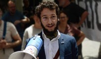 Lawrence (Ya'aqov) Shenkin at a protest against violence against aid convoys to the Gaza Strip, 2024.