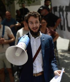 Lawrence (Ya'aqov) Shenkin at a protest against violence against aid convoys to the Gaza Strip, 2024. Credit: Bnei Avraham Lawrence (Ya'aqov) Shenkin at a protest against violence against aid convoys to the Gaza Strip, 2024.