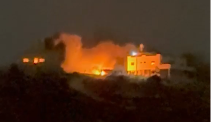 Smoke billows at the Tubasi family home in Jalud, West Bank, overnight into Tuesday.