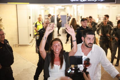 Passengers arrive in Ben-Gurion airport after the flydubai incident on Wednesday.
