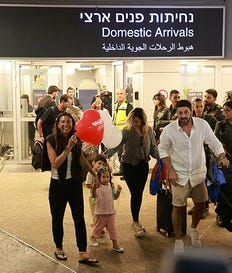 Passengers arriving at Ben Gurion Airport following the suspected hijacking of a flydubai flight from Dubai to Israel, Wednesday.