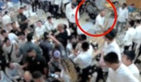 Eliya Azrad throwing a sault shaker toward Naftali Bennett, earlier this week.
